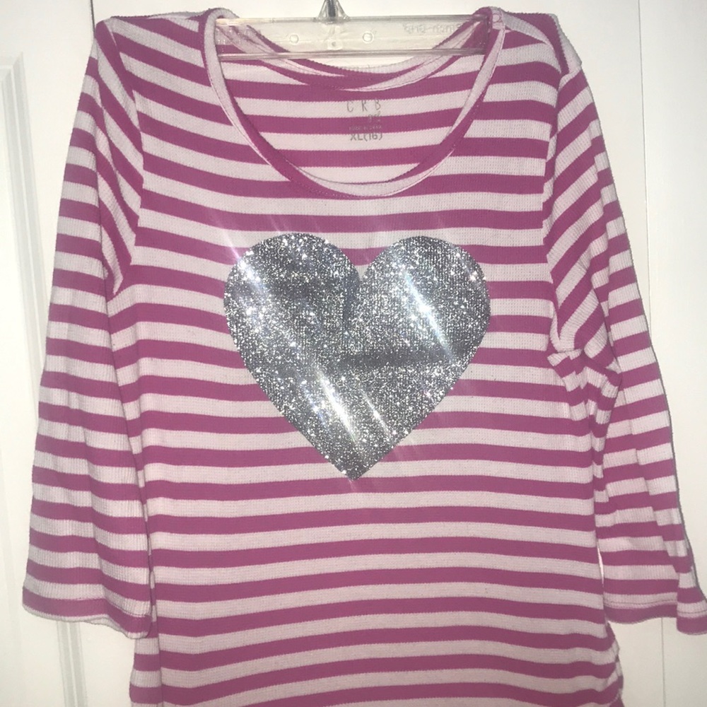 A pink striped shirt with a cool glittery heart!!